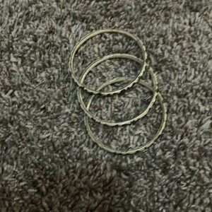 Three thin leaf bracelets